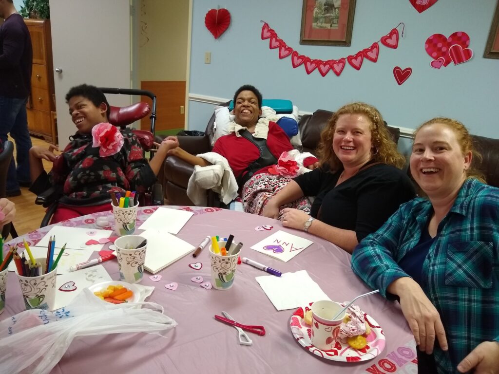 Elly Jones creates Valentine's Day crafts with SOAR365 Adult Day Support participants