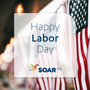 An image of an American flag with "Happy Labor Day" overlaid across the center of the image.